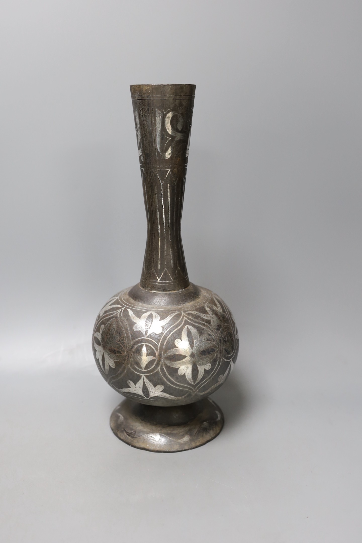 An Indian Bidriware vase, 34 cms high.